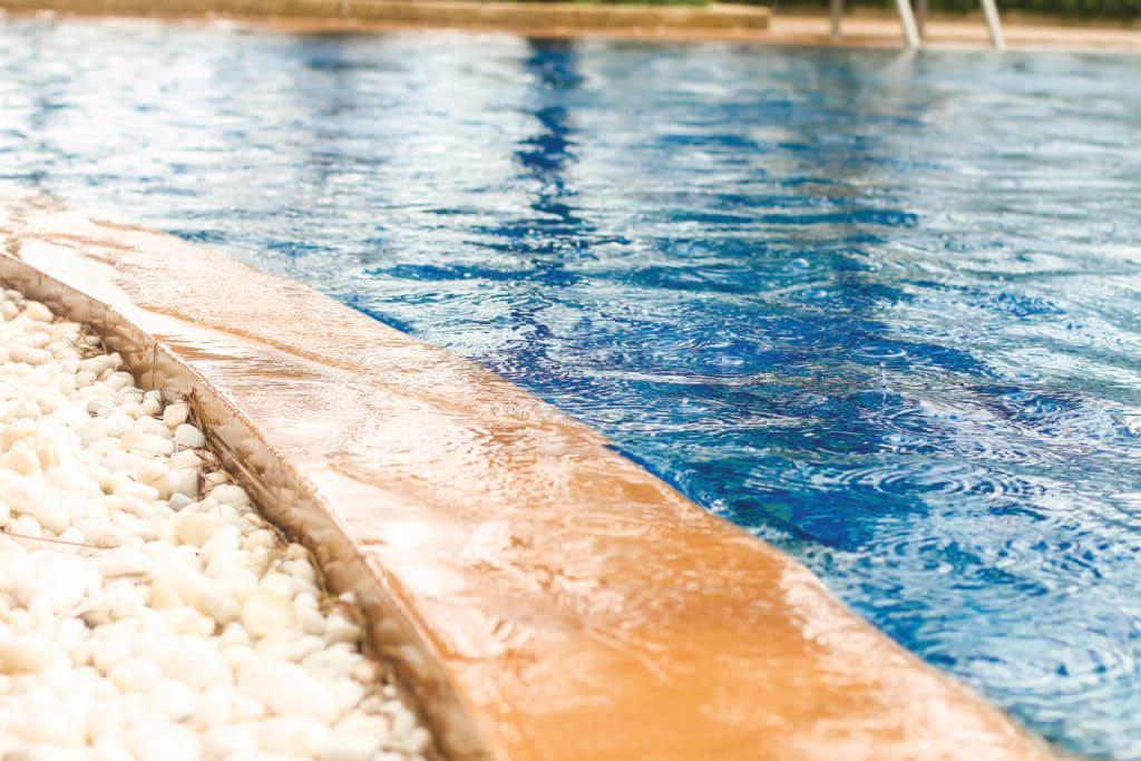 Rain on pool water surface