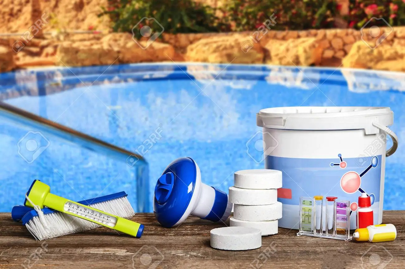 126485875-equipment-with-chemical-cleaning-products-and-tools-for-the-maintenance-of-the-swimming-pool