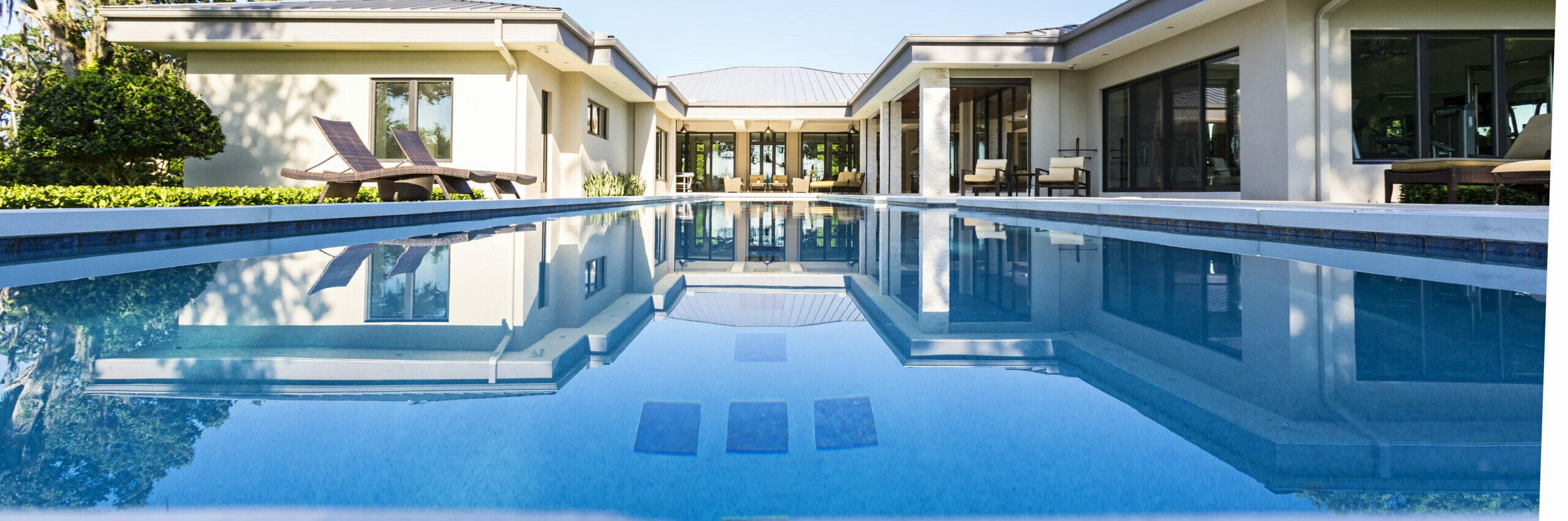 A beautiful pool deck setting on a calm summer morning.
