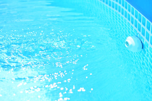 Pool filling with fresh and clean blue water. Photo for The Facts On Filter Media blog post. Shop at Swimart.