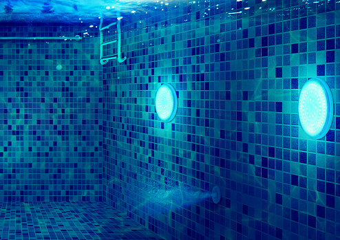 istockphoto-1205909775-170667a Every Swimming pool needs lighting. Using Underwater LED Light, swimming pool become cool place to relax and swim activity. This digital image convey all the swimming pool business needs for promotion.